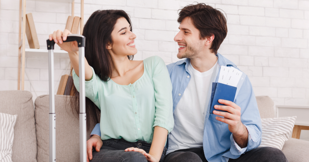 A couple holding hands with a UK visa and passport, symbolizing the UK Spouse Visa process from Pakistan.